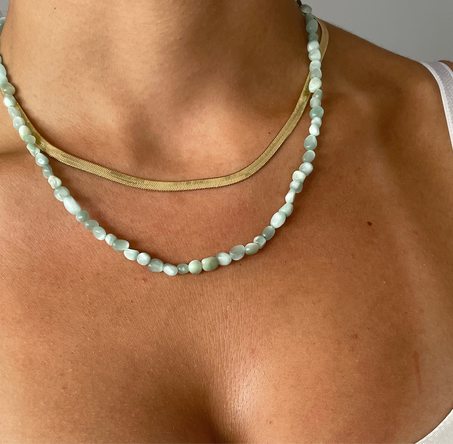 Collar Ophidia dorado y brisa turquesa
